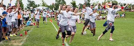 players with medal smiling